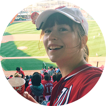 Lesley sneakily wearing Washington Nationals gear at a Hiroshima Carp baseball game in Japan. Go Nats!